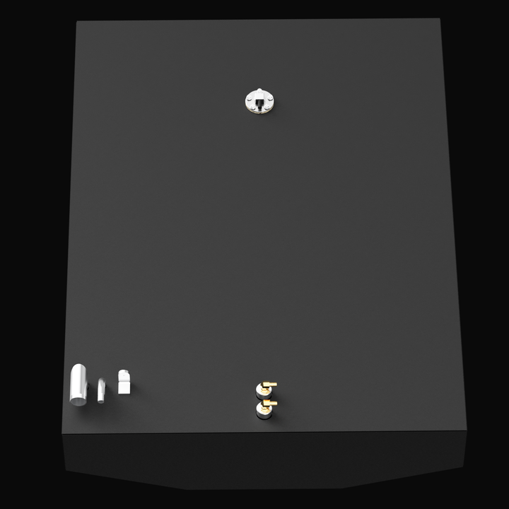 Top-down angled view of a black marine fuel tank designed for the Boston Whaler Impact 21 (1999) with a 60-gallon capacity. The tank features a beveled front edge and a centered circular fuel level sender, with two brass elbow fittings and three metal fittings located near the front edge.