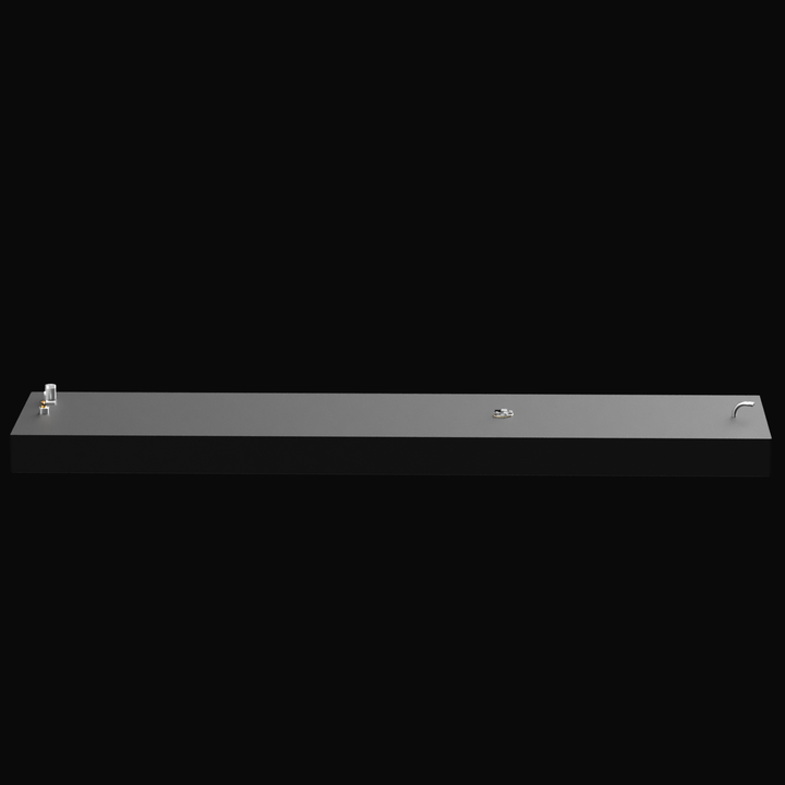 A 3D render showing a long side profile of a dark grey boat fuel tank, highlighting the three distinct clusters of metallic fittings visible on the top edge, against a reflective black background.