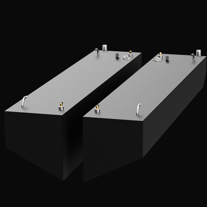 A 3D render of a pair of long, rectangular, dark grey boat fuel tanks with light grey tops, shown side-by-side at an angle. Both tanks feature multiple silver and brass-colored fittings on their top surfaces, isolated against a black background.