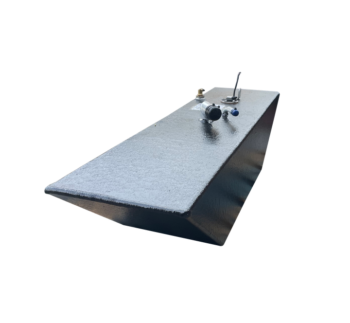 A low-angle photo of a long, wedge-shaped boat fuel tank with a dark, textured finish. The top surface shows various fittings, including a fuel sender and valve connections, against a transparent checkerboard background.