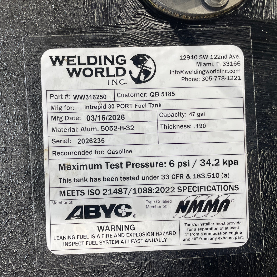 Close-up of an official Welding World Inc. manufacturing label for an Intrepid 30 port fuel tank. The label verifies a 47-gallon capacity, .190" Aluminum 5052-H32 construction, and compliance with USCG 33 CFR & 183.510 (a) and ISO 21487/1088:2022 specifications. Detailed certification markings from ABYC and NMMA guarantee a high-quality, pressure-tested OEM replacement.