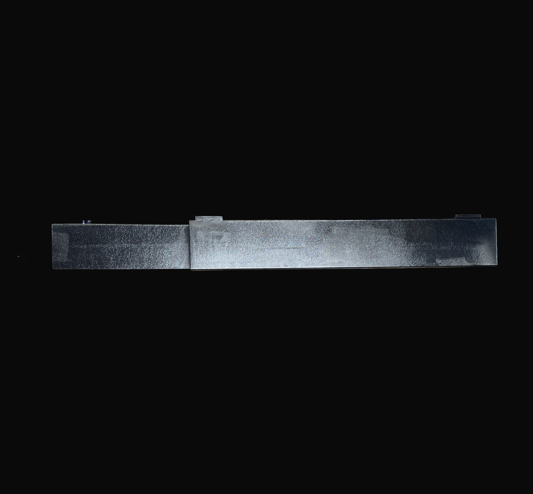 A full-length bottom plan studio view of a single physical, finished black encapsulated Jupiter 31 Cuddy port or starboard OEM replacement saddle fuel tank (105 gal) from file image_4a9505.png, isolated against a black background. This underside perspective illustrates the tank's custom stepped and tapered bottom geometry, precision-fabricated from heavy-gauge marine-grade 5052-H32 aluminum to sit flush within the vessel's outboard hull stringer bay. The entire bottom plate assembly is fully encapsulated in