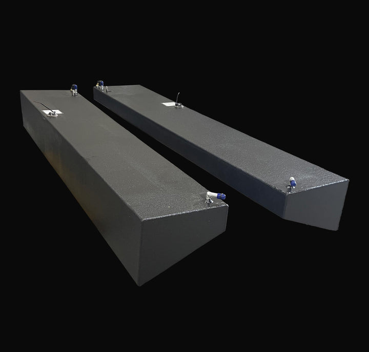 Pair of 47-gallon port and starboard wing fuel tanks for a 1991 Intrepid 30 replacement. The image shows the specialized sloped hull-conforming geometry and heavy-duty Coal Tar Epoxy coating, ensuring a guaranteed OEM fit and maximum corrosion resistance for classic Intrepid restorations.