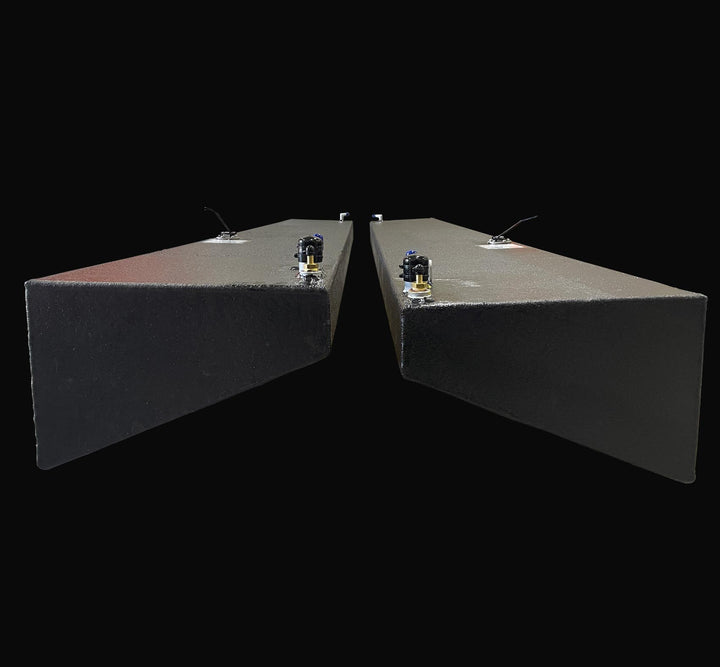 Front-facing profile of a 1991 Intrepid 30 wing fuel tank pair (Port and Starboard) showing the specialized sloped hull-conforming geometry. Each 47-gallon replacement tank is constructed from heavy-duty .190" marine-grade aluminum and finished with a high-build Coal Tar Epoxy coating, ensuring a guaranteed OEM fit and superior corrosion resistance for classic Intrepid restorations.