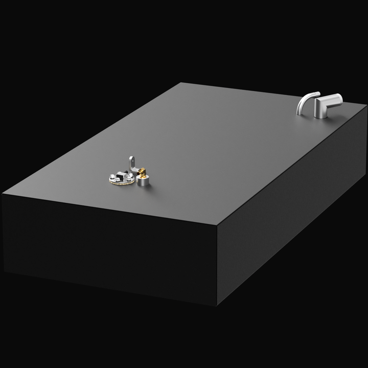 3D render of a black rectangular marine fuel tank with smooth edges and a matte finish. It has a fuel fill pipe with an elbow on one corner and a sending unit with brass fittings on the opposite corner. The background is black