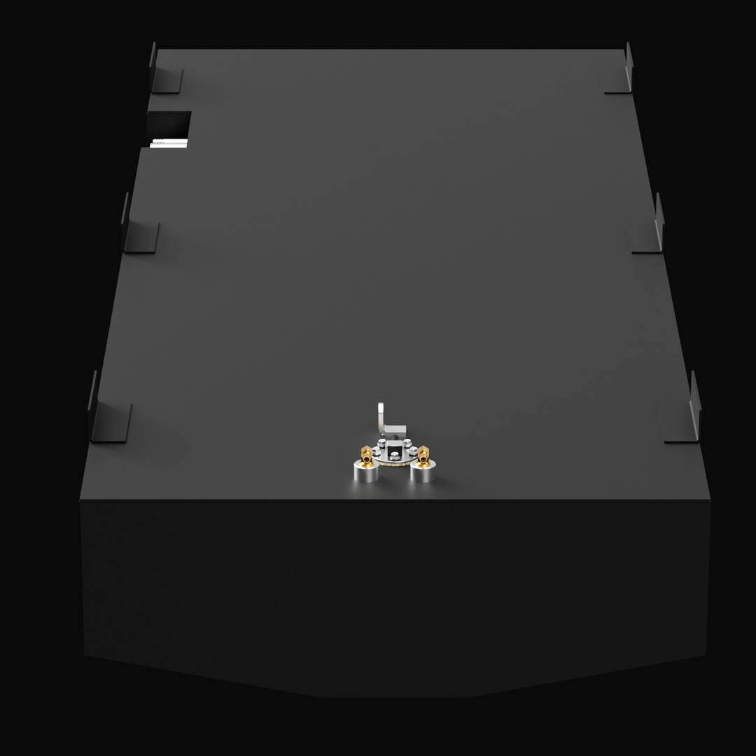 Top-front orthographic view of a black marine fuel tank with an angled front face. The tank features a centralized cluster of metallic and brass fuel fittings on top, and eight mounting tabs evenly distributed along the side edges.