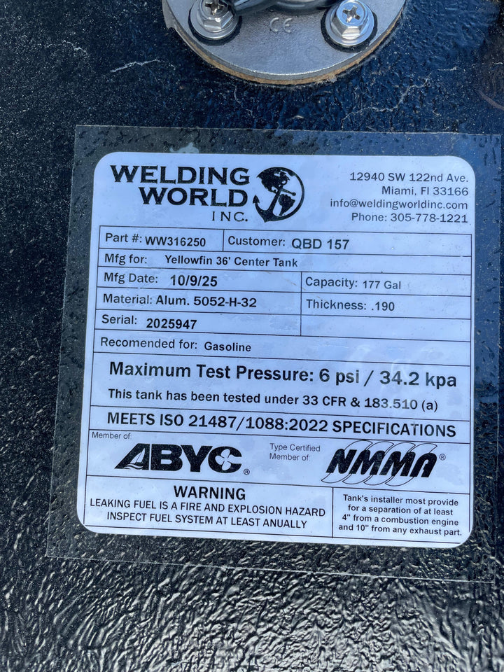 A close-up of a white specification label on a dark textured boat fuel tank. The Welding World Inc. label lists the part as WW316250, manufactured for a Yellowfin 36' Center Tank, with a 177-gallon capacity.