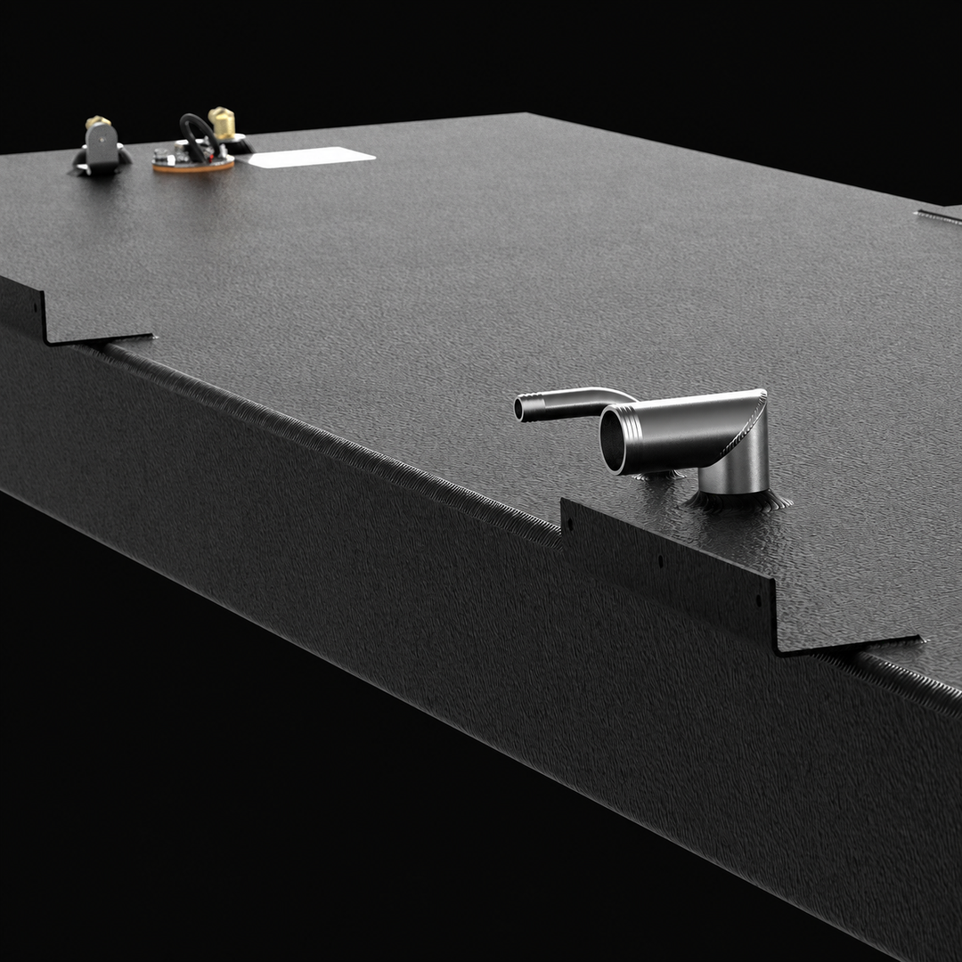 Close-up mid-deck plumbing layout view of a black Action Marine 25 replacement marine fuel tank. The image highlights the heavy-duty mechanical hardware mounted on a heavy-gauge marine-grade 5052-H32 aluminum tank body, which is fully encapsulated in a textured, anti-corrosive black TarGard epoxy coating. This 115-gallon configuration features an integrated 90-degree fuel fill pipe connection and an adjacent 90-degree tank vent line, situated next to side-mounted structural mounting flanges. An electronic f
