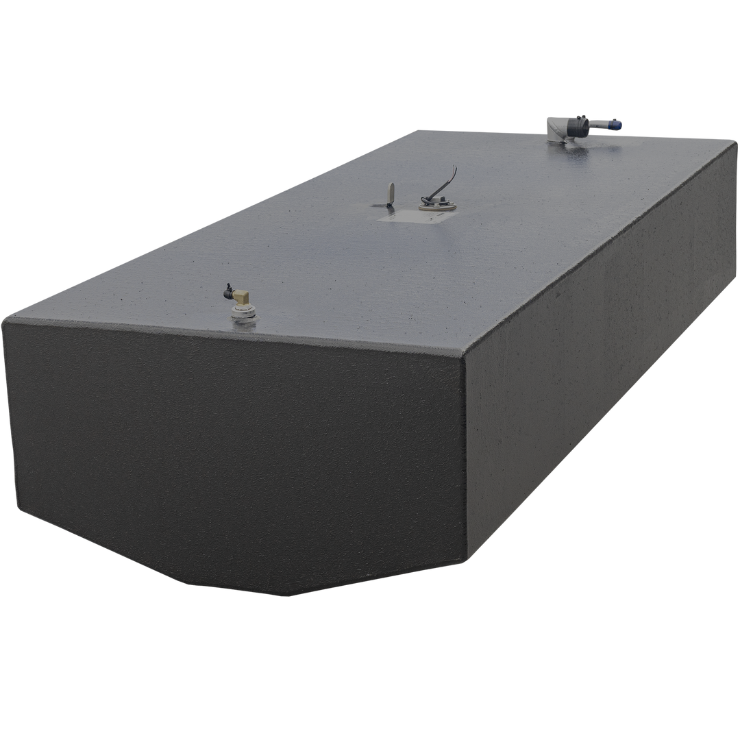 A large rectangular fuel tank with a textured black surface, shown from a front-left angle with a transparent checkerboard background. The tank has a trapezoidal front face and several fittings on the top, including a white capped vent pipe with a blue band at the rear right corner, a circular access hatch with wires in the center, and a smaller fitting near the front left corner. The tank appears heavy-duty and industrial