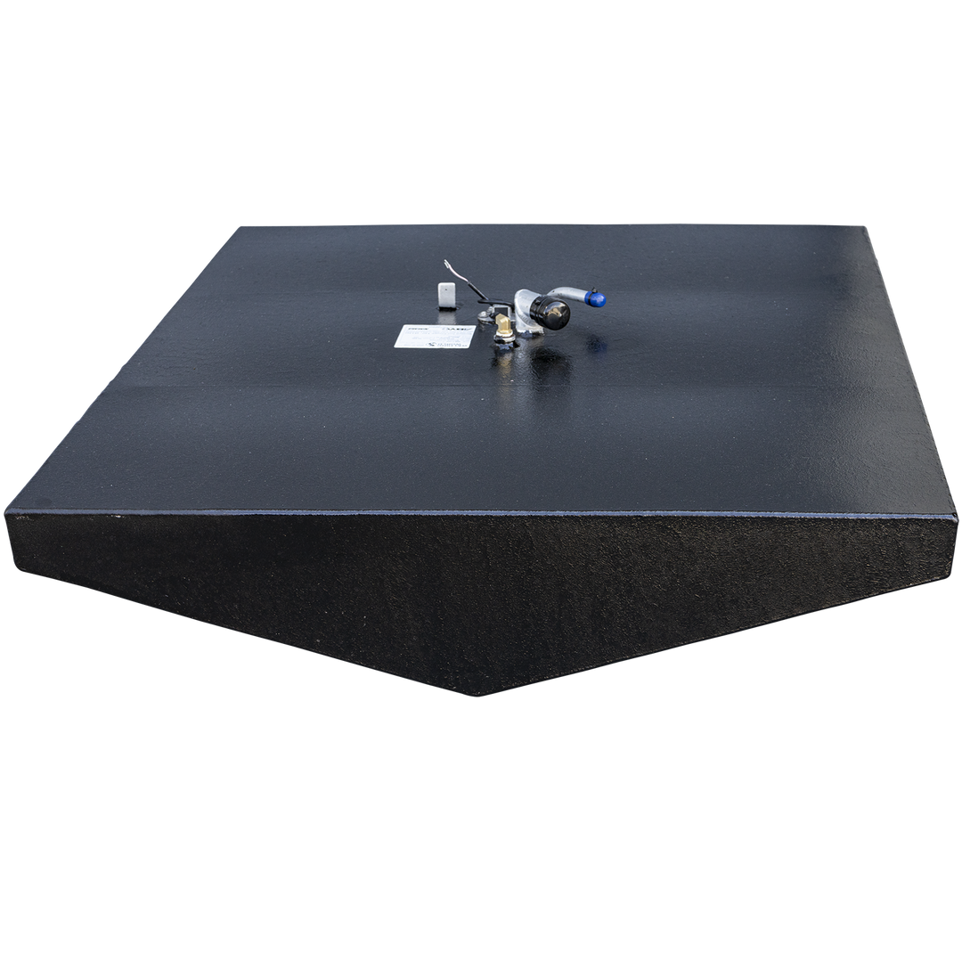 A boat fuel tank with a heavy, textured black coating and a tapered, coffin-like shape, wider at the rear than the front. The tank is viewed from a high front angle that displays its V-shaped bottom, set against a checkered background. A dense cluster of various fuel fittings, including a sending unit and vent pipe, is centered on the flat top surface