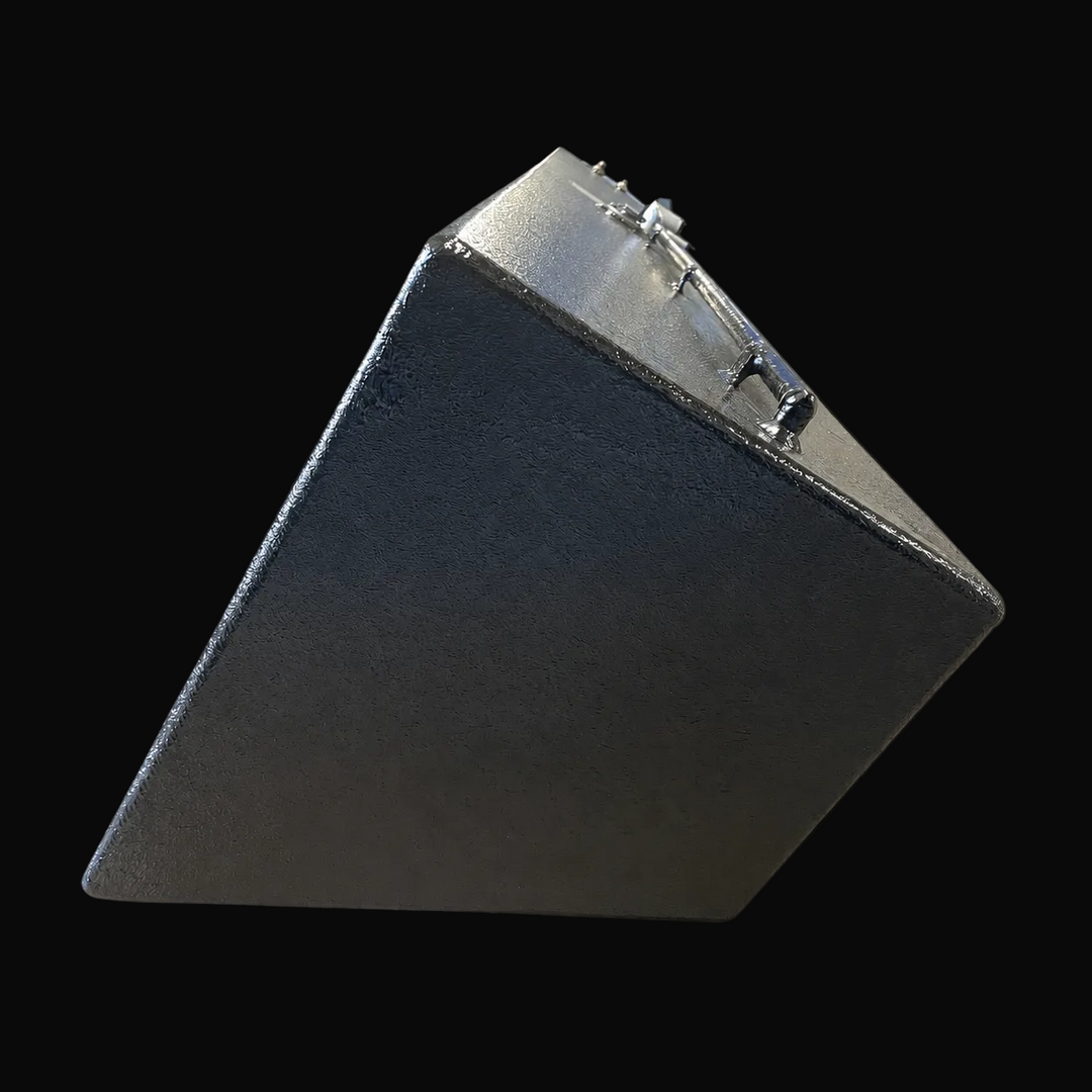 A low-angle rear-elevation end view of a single black Contender 32 outboard saddle replacement marine fuel tank from file image_a1dabc.jpg, isolated against a black background. This specific perspective isolates one of the long, asymmetrical wedge-shaped fuel cells from the multi-tank system combo, highlighting its unique cross-sectional profile with a sharply sloped outer wall engineered by Welding World to match the upward rise of the vessel's hull side. Precision-fabricated from heavy-gauge marine-grade 