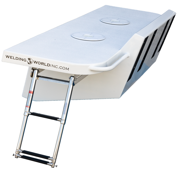 A custom-built Apex Mk. II twin engine bracket featuring a flat, white surface with two circular hatches. The bracket has a sleek design with black accents and a handle on one side. A sturdy metal ladder is attached to the front, allowing easy access to the top. The branding "WELDINGWORLDINC.COM" is visible on the surface. The background is transparent