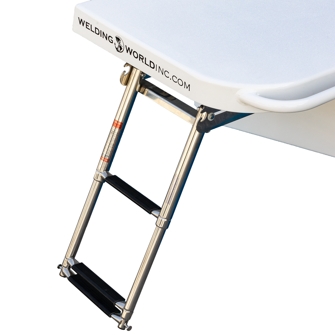 A close-up image of a custom-built Apex Mk. II twin engine bracket, featuring a sturdy stainless steel frame with a white top surface. The bracket is designed for durability and functionality, showcasing a logo that reads "WELDING WORLD INC." on the edge. The image has a transparent background, emphasizing the bracket's design and construction