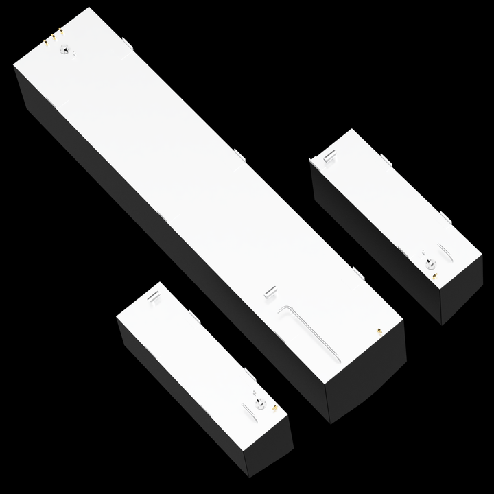 This image displays a set of three rectangular fuel tanks with black sides and white tops, arranged side by side on a black background. The tanks vary in size, with the largest in the center, flanked by two smaller tanks on either side. Each tank has metal mounting tabs along the edges and multiple fittings, including valves and vents, located on the top surface. The tanks are shown from an angled top-down perspective, highlighting the structural 