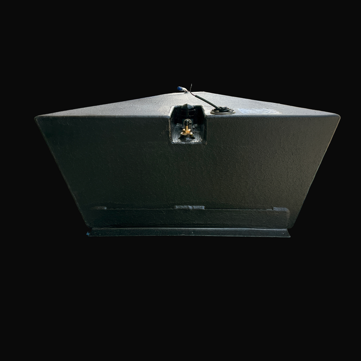 A studio head-on rear perspective view displaying the aft end and bottom mounting flange of a physical, finished black encapsulated Dolphin Skiffs 16 OEM replacement marine fuel tank (25 gal 1998) from file image_43309c.jpg, isolated against a black background. Precision-fabricated from heavy-gauge marine-grade 5052-H32 aluminum, the wide wedge-shaped aft body is fully encapsulated in a protective, textured black TarGard epoxy coating to resist severe saltwater pitting and bilge moisture decay. The center r