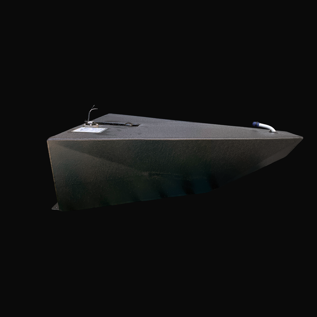 An eye-level studio side profile view displaying the tapered wedge hull geometry of a physical, finished black encapsulated Dolphin Skiffs 16 OEM replacement marine fuel tank (25 gal 1998) from file image_4334b6.jpg, isolated against a black background. Precision-fabricated from heavy-gauge marine-grade 5052-H32 aluminum, the custom-contoured wedge body is fully encapsulated in a protective, textured black TarGard epoxy coating to resist severe saltwater pitting and bilge moisture decay. The profile highlig