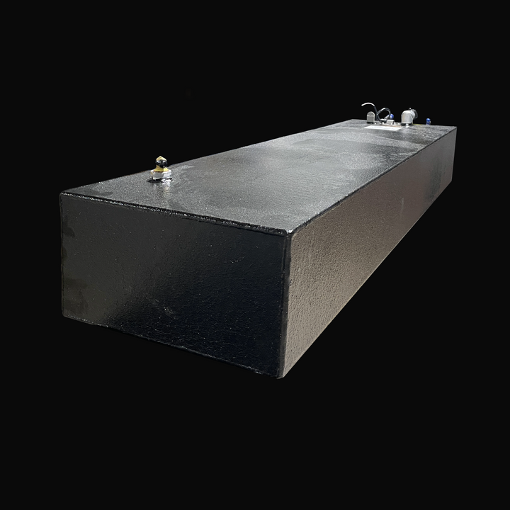 A studio high-angle isometric perspective view showing the full length of a physical, finished black encapsulated Eagle 17 OEM replacement marine fuel tank (29 gal 2000) from file image_49b41a.jpg, isolated against a black background. Precision-fabricated from heavy-gauge marine-grade 5052-H32 aluminum, the long low-profile rectangular body is fully encapsulated in a protective, textured black TarGard epoxy coating to resist severe saltwater pitting and bilge corrosion. The top deck fitting layout features 