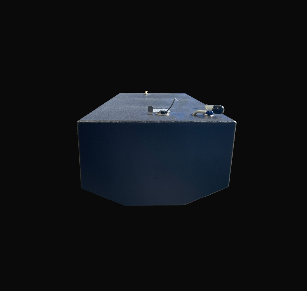 A studio front-facing end perspective view looking down the full length of a physical, finished black encapsulated Edgewater 24 OEM replacement marine fuel tank (110 gal) from file image_9c6d3d.jpg, isolated against a black background. Precision-fabricated from heavy-gauge marine-grade 5052-H32 aluminum, the custom V-bottom body is fully encapsulated in a protective, textured black TarGard epoxy coating to resist severe saltwater pitting and bilge moisture decay. Foreground top deck fittings feature an alum