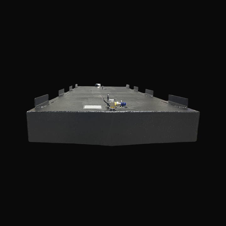 A studio low-angle rear end perspective view highlighting the subtle V-bottom deadrise contour and symmetrical mounting tabs of a physical, finished black encapsulated Fountain 24 OEM replacement marine fuel tank (130 gal) from file image_c46a88.jpg, isolated against a black background. Precision-fabricated from heavy-gauge .190" marine-grade 5052-H32 aluminum, the elongated hull-conformed body is fully encapsulated in a protective, textured black TarGard epoxy coating to resist severe saltwater pitting and