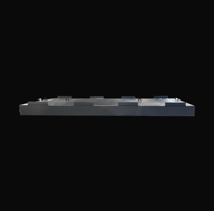 An eye-level studio side profile view displaying the opposite side elevation and low-profile 8 1/2-inch depth of a physical, finished black encapsulated Fountain 24 OEM replacement marine fuel tank (130 gal) from file image_c4632a.png, isolated against a black background. Precision-fabricated from heavy-gauge .190" marine-grade 5052-H32 aluminum, the elongated rectangular hull cell is fully encapsulated in a protective, textured black TarGard epoxy coating to resist severe saltwater pitting and bilge moistu