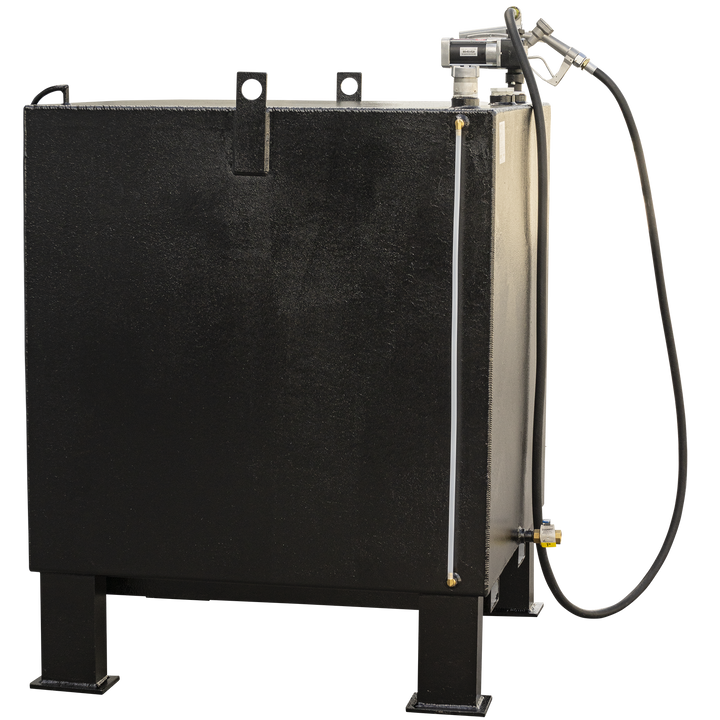 A black, rectangular fuel tank with a textured finish, viewed from a slight angle. It has four sturdy legs, two visible at the front. A fuel pump and nozzle assembly is on the top right, with a black hose extending downwards. A white translucent tube runs vertically along the right side, and a brass valve with a blue handle is visible near the bottom right. Two lifting hooks are on the top surface