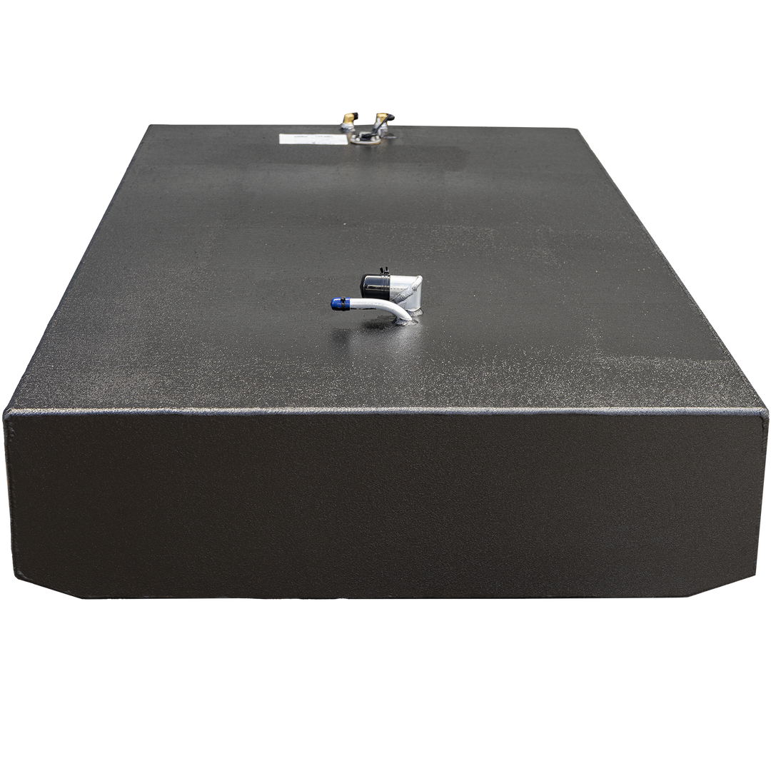 Front view of a black rectangular fuel tank with a textured surface. The tank has two fittings on the top, including a black and white valve with a blue cap, and an attached label with specifications. The tank is shown isolated on a transparent background