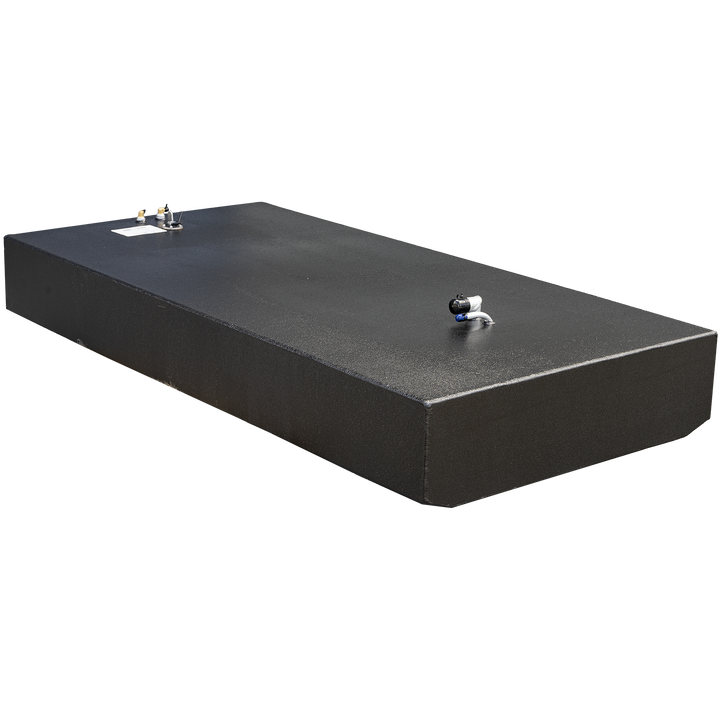 Isolated black rectangular fuel tank with a textured surface, featuring two fittings on the top — a black and white valve with a blue cap, and another smaller fitting near a white label. The tank is shown on a transparent background