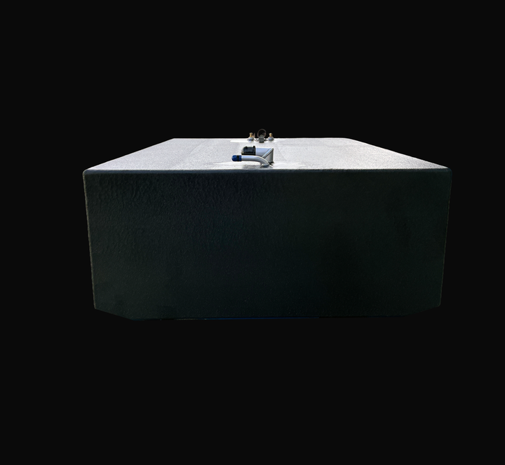 A studio front-facing end perspective view looking down the length of a physical, finished black encapsulated Grady White 272 Sailfish Main OEM replacement marine fuel tank (150 gal) from file image_2a377a.jpg, isolated against a black background. Precision-fabricated from heavy-gauge marine-grade 5052-H32 aluminum, the wide rectangular body is fully encapsulated in a protective, textured black TarGard epoxy coating to resist severe saltwater pitting and bilge moisture decay. Foreground top deck fittings fe
