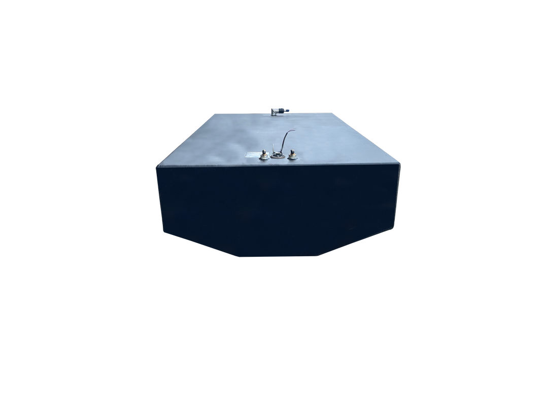 A low-angle photo of a large, dark grey boat fuel tank with a faceted bottom. The top surface features a fuel sending unit, a specification plate, and pipe fittings, all against a transparent checkerboard background.