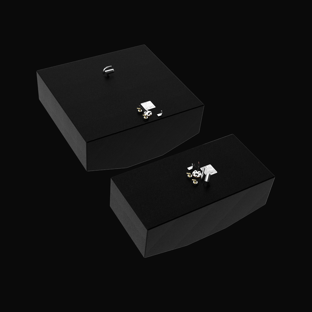 A high-angle isometric studio view of a complete dual-tank package featuring physical, finished black encapsulated Grady-White 282 Sailfish Main (140 gal) and Auxiliary (66 gal) OEM replacement marine fuel tanks from file image_f0ed61.jpg, isolated against a black background. Both rectangular cells are precision-fabricated from heavy-gauge marine-grade 5052-H32 aluminum with custom V-bottom deadrise angles to fit seamlessly inside the vessel's center-cavity bilge compartments. Each tank is fully encapsulate