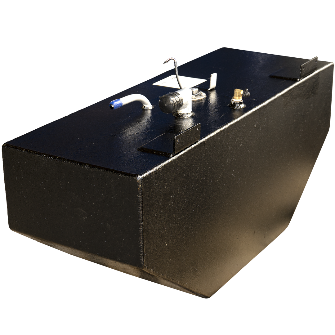 A black, rectangular fuel tank with a textured surface, shown from an elevated angle. The tank features a chamfered bottom edge and several components on its top surface, including a curved metal pipe with a blue tip, a cylindrical fitting with a black cap, a circular access point with a thin metal arm and wires, a small white rectangular sensor, and two black L-shaped mounting brackets