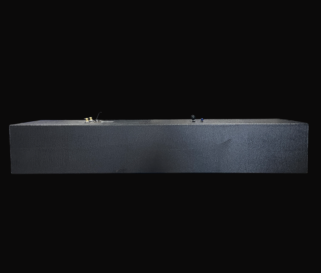 Side-profile view of a 192-gallon Hydra Sport 25 (1994) belly fuel tank showcasing the uniform Coal Tar Epoxy coating and 97.75-inch length. The image highlights the tank’s low-profile design and top-mounted fittings, ensuring a guaranteed OEM fit and proper clearance within the boat's center stringer compartment.