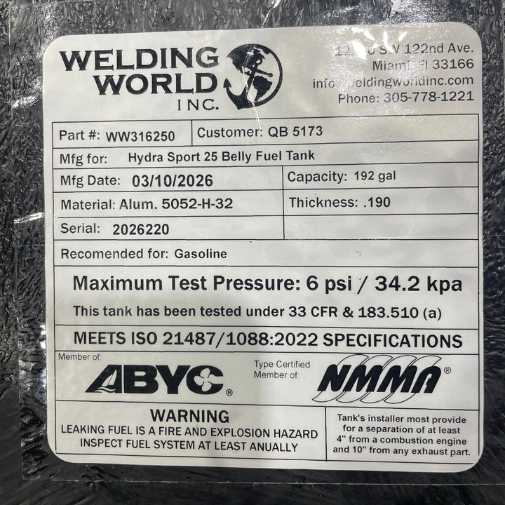 Close-up of the official Welding World Inc. manufacturing label on a 192-gallon Hydra Sport 25 belly fuel tank. The tag confirms the .190" aluminum thickness, 5052-H32 material grade, and 6 psi pressure test certification, ensuring this Coal Tar Epoxy coated tank meets all USCG and ABYC safety standards for a guaranteed OEM fit.