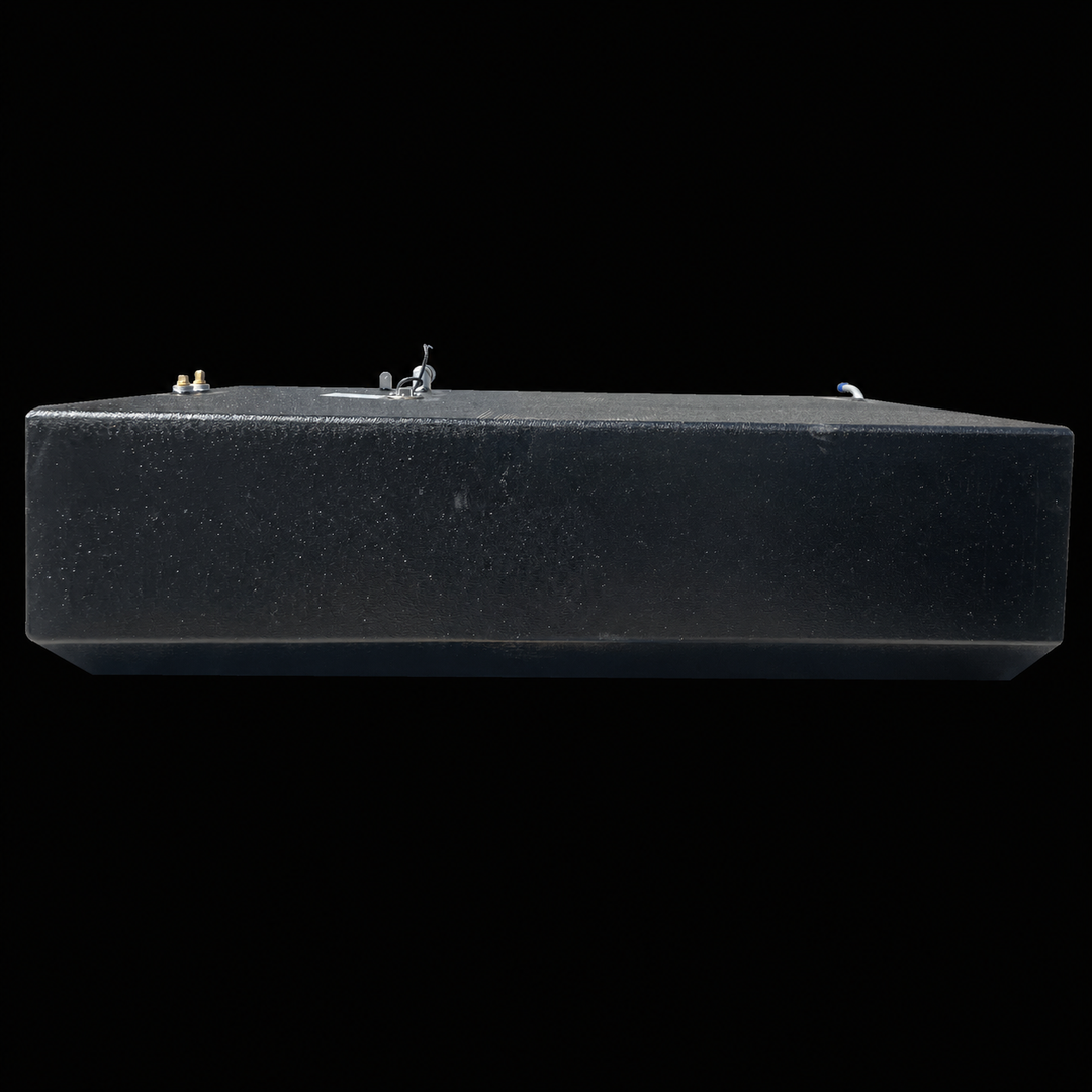 A straight side-elevation profile view of a black Intrepid 26 Original Belly replacement marine fuel tank from file image_0a8b98.jpg, isolated against a black background. This low-angle longitudinal perspective showcases the elongated rectangular block profile of the 158-gallon center-hull fuel cell, highlighting the subtle, symmetrical V-shaped angled bottom profile precision-engineered by Welding World to align cleanly with the vessel's central deadrise stringer grid. Precision-fabricated from heavy-gauge