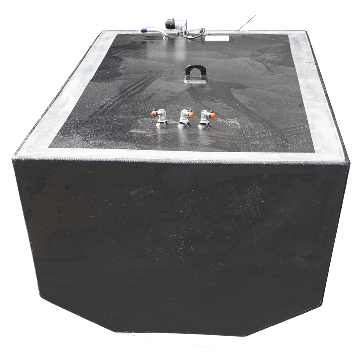 A large, black fuel tank, likely for a boat, is shown against a checkerboard background. It has a broad, rectangular top surface with a silver-colored trim around the edge. Various metal fittings and connectors are visible on the top, including three small, orange-tipped valves in the foreground and a larger, U-shaped handle near the center. The tank's body is also black and appears to have a slightly textured finish