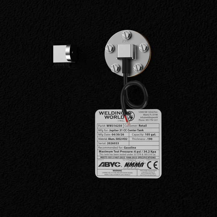 Close-up detail of the KUS fuel sending unit and official Welding World Inc. manufacturing label on a Jupiter 31 CC Center fuel tank. The label verifies technical specifications including a 105-gallon capacity, .190" thickness 5052-H32 aluminum construction, and compliance with ABYC, NMMA, and CE standards. This protective black Coal Tar Epoxy finish ensures maximum durability for direct OEM replacement kits.