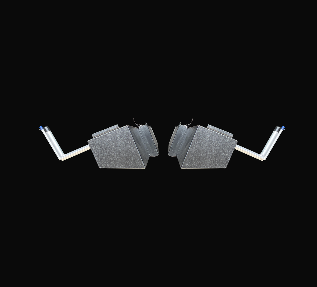 A head-on end elevation studio view showing a matched mirror-image pair of physical Jupiter 31 Cuddy port and starboard OEM replacement marine fuel tanks (105 gallons each) from file image_4a8e60.png, isolated against a black background. This cross-sectional end perspective clearly illustrates the custom mirrored deadrise angles and tapered bottom profiles, engineered to fit symmetrically into the outboard stringer bays of the hull. Precision-fabricated from heavy-gauge marine-grade 5052-H32 aluminum, both 