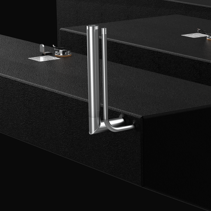 Close-up detail of the precision-welded 316 stainless steel fuel fill and vent tubes on a Jupiter 31 replacement fuel tank. The image highlights the high-quality TIG welding and the durable black Coal Tar Epoxy finish on the .190" marine-grade aluminum body. These custom-bent fittings are engineered to match factory specifications for a guaranteed 100% drop-in fit and long-term corrosion resistance in harsh offshore environments.