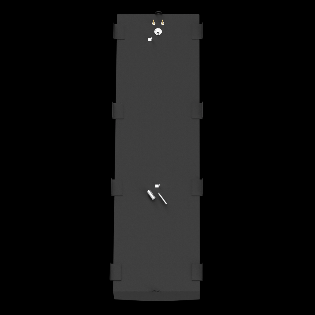 An overhead view of a long, dark gray rectangular fuel tank. It has multiple L-shaped mounting brackets along its long edges. Various fittings and ports, including a circular opening and several small protrusions, are visible on the top surface. A single ring is also present near one end