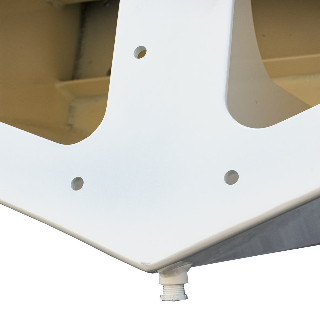 Close-up view of the high flotation bracket on a 1987 Mako 258 Cuddy twin engine boat, showcasing the white metal structure with mounting holes