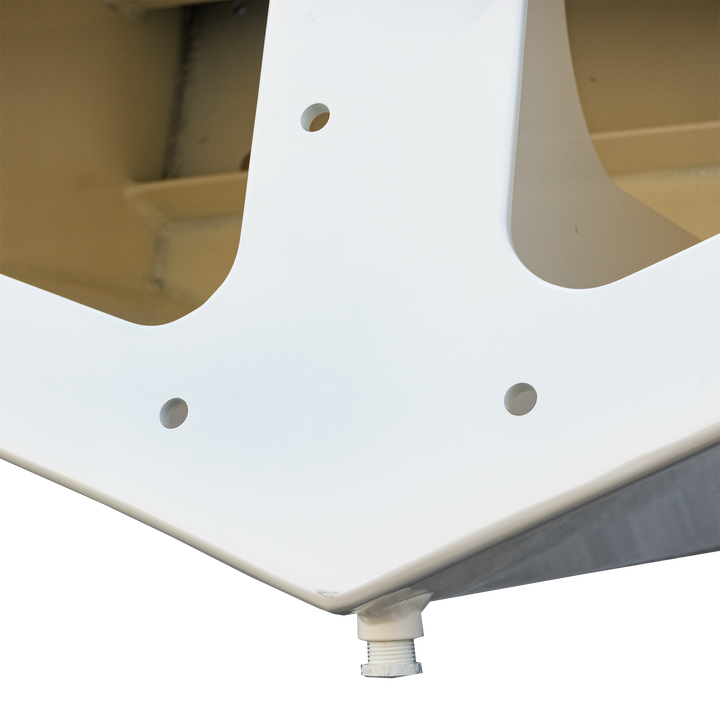 Close-up view of the high flotation bracket on a 1987 Mako 258 Cuddy twin engine boat, showcasing the white metal structure with mounting holes