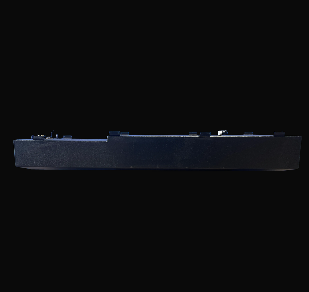 Side elevation view of the 1998 Mako 261 replacement fuel tank (171 gal), capturing the full longitudinal profile. The image displays the stepped top deck design, distinct welded mounting tabs along the upper edge, and black-coated aluminum construction.