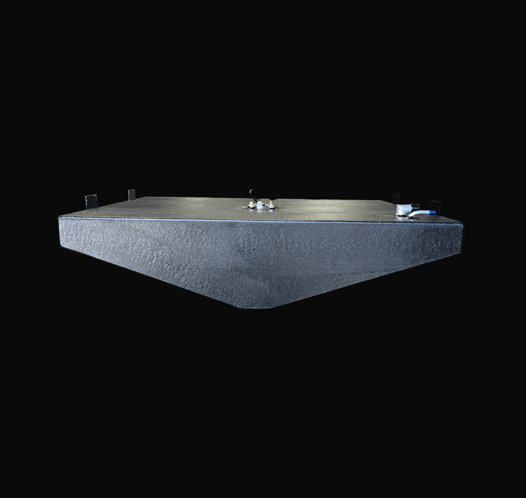 A straight, low-angle front-elevation view of a black Parker 23 replacement marine fuel tank from file image_97f358.jpg, isolated against a black background. This perspective highlights the wide, shallow front profile of the 140-gallon center-hull fuel cell, clearly showing the distinct, V-shaped angled bottom profile precision-engineered by Welding World to conform perfectly to the boat's central deadrise stringer grid. The heavy-duty structure is fully fabricated from marine-grade 5052-H32 aluminum and en