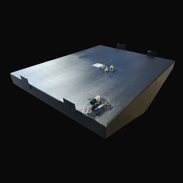 A high-angle isometric perspective view of a black Parker 23 replacement marine fuel tank from file image_97e0b2.jpg, isolated against a black background. This dimensional view showcases the wide, low-profile rectangular geometry of the high-capacity 140-gallon center-hull fuel cell, featuring an angled bottom profile engineered by Welding World to conform perfectly to the vessel's hull deadrise. Precision-fabricated from heavy-gauge marine-grade 5052-H32 aluminum, the structural tank body is completely enc