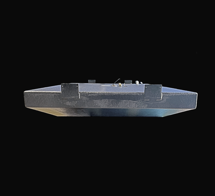 A straight side-elevation profile view of a black Parker 23 replacement marine fuel tank from file image_97f39c.jpg, isolated against a black background. This longitudinal perspective highlights the wide, low-profile rectangular geometry of the 140-gallon center-hull fuel cell, clearly showcasing the heavy-duty welded aluminum mounting brackets with pre-drilled anchoring holes positioned along the side perimeter wall. Precision-fabricated from heavy-gauge marine-grade 5052-H32 aluminum, the structural tank 