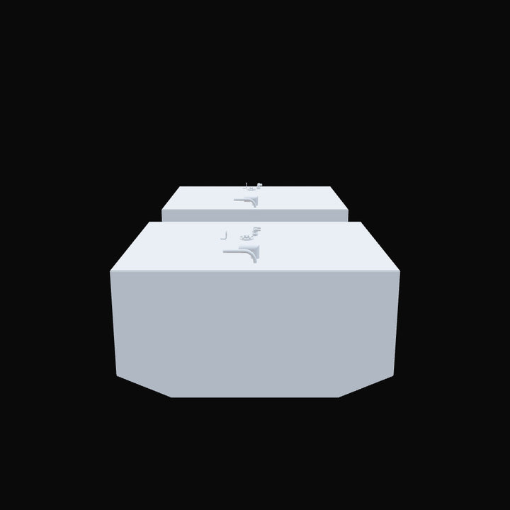 Two light grey, rectangular fuel tanks, each with various pipe connections and fittings on their top surfaces. The tank in the foreground has an angled bottom corner, while the tank in the background is a simple rectangle. Both are set against a solid black background