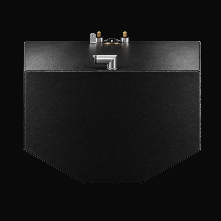 A studio front/end elevation profile view showcasing the compound V-bottom hull contour, protective black TarGard epoxy coating, and top/edge fitting arrangement of a finished Proline 23 WA replacement marine fuel tank (140 gal) from file image_7d3d06.jpg against a black background. Fabricated by Welding World in Miami, FL from heavy-gauge marine-grade aluminum, the end cross-section highlights precision routing of fill necks, vents, and dual fuel pickup/sending unit assemblies engineered for a 100% direct 