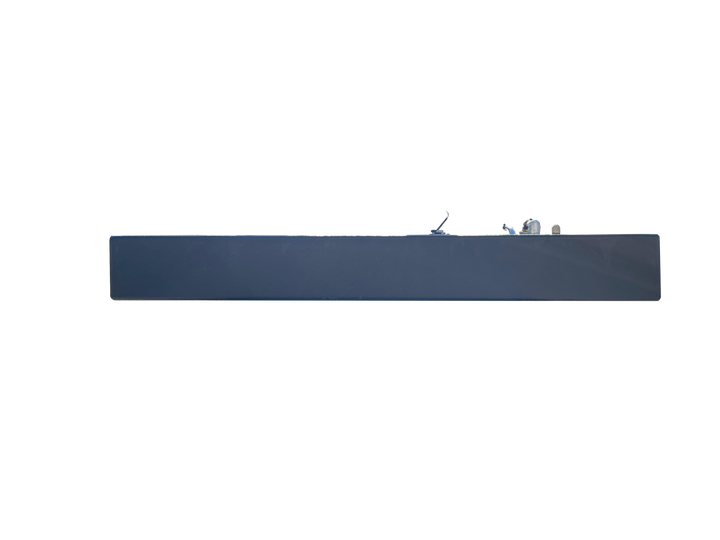 A profile photo showing the dark, heavily textured boat fuel tank with a faceted bottom. A cluster of brass, silver, and blue plastic fittings is visible on the top edge, against a transparent checkerboard background.