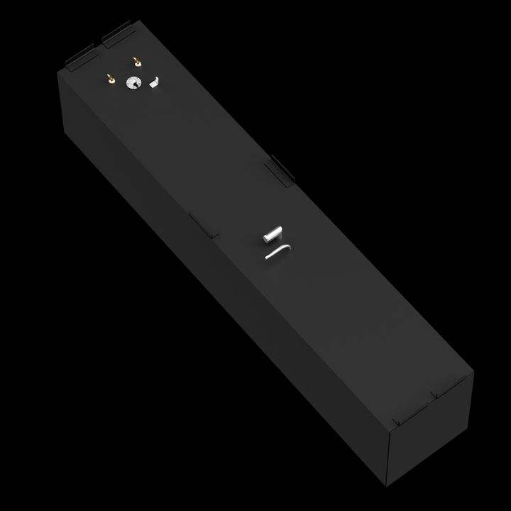 A black rectangular marine fuel tank viewed at a diagonal from above on a black background. The tank has a smooth finish with various fittings on the top end, including two small brass connectors, a round metal port, a curved silver pipe, and a smaller bent pipe. There are black mounting brackets attached along the tank's length on the sides