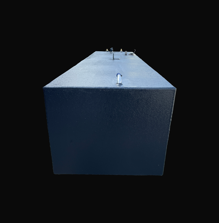 A rear profile end view looking down the length of a SeaVee 25 main replacement marine fuel tank with a 147-gallon capacity. This perspective showcases its rectangular body and premium textured black TarGard epoxy finish designed for robust corrosion resistance in marine bilges. A dedicated vent fitting is visible in the foreground on the top deck, while a central lifting ring, fuel level sending unit, and brass pickup clusters line the far edge. Precision-engineered from heavy-duty marine-grade 5052-H32 al